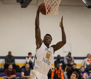 Golden Eagles Use OT Run to Stun Trojans, 104-97